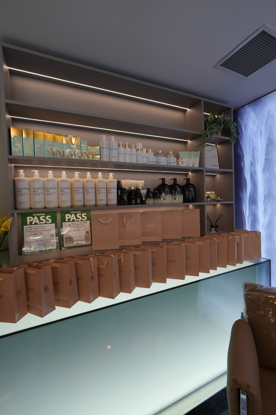 Yardley gift bags lined along the backlit boutique counter